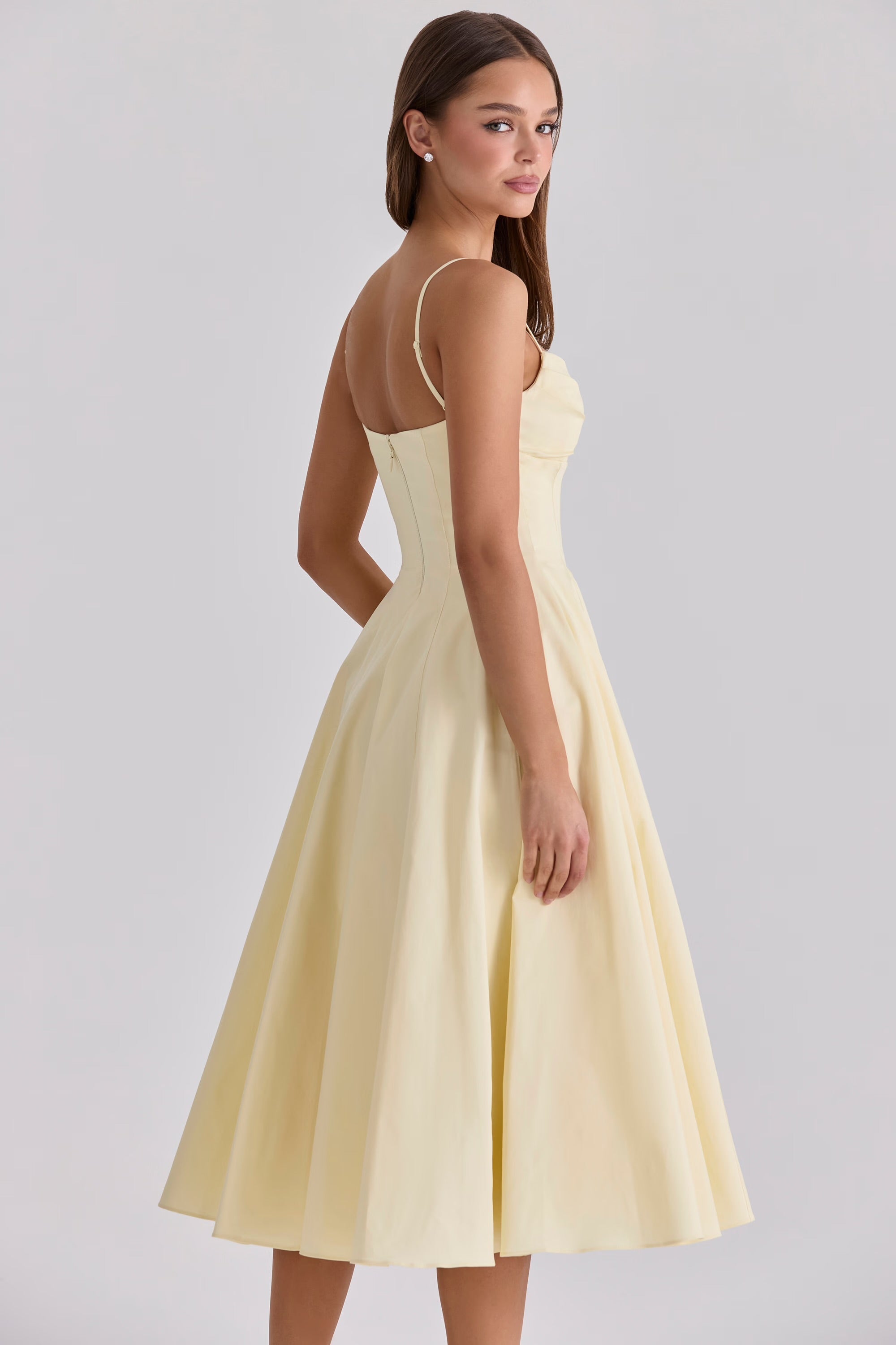 Vestido midi de algodón — tirantes ajustables y bolsillos laterales