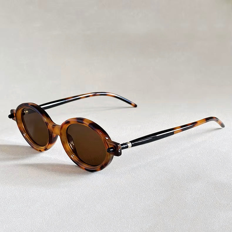 Retro oválné sluneční brýle s UV400 ochranou a vintage designovým rámem unisex