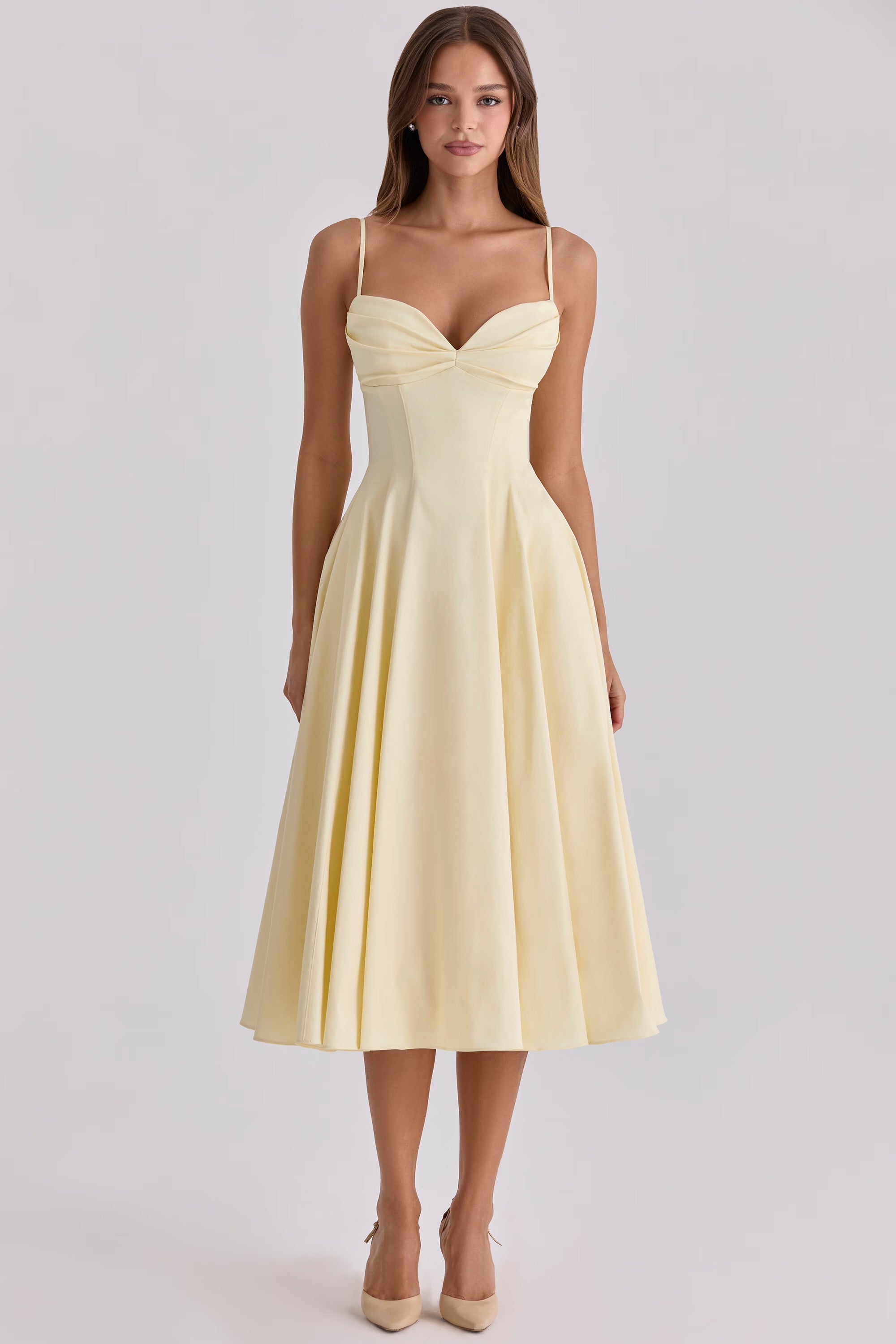 Vestido midi de algodón — tirantes ajustables y bolsillos laterales