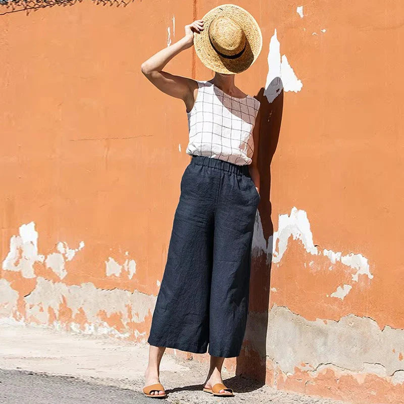 Dámské lněné kalhoty s širokými nohavicemi, elastickým pasem a střihem ke kotníkům