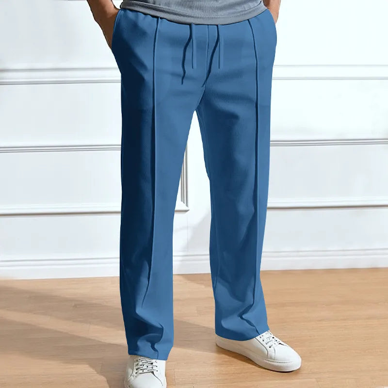 Men's pants with flexible fit, elastic waistband, and drawstring