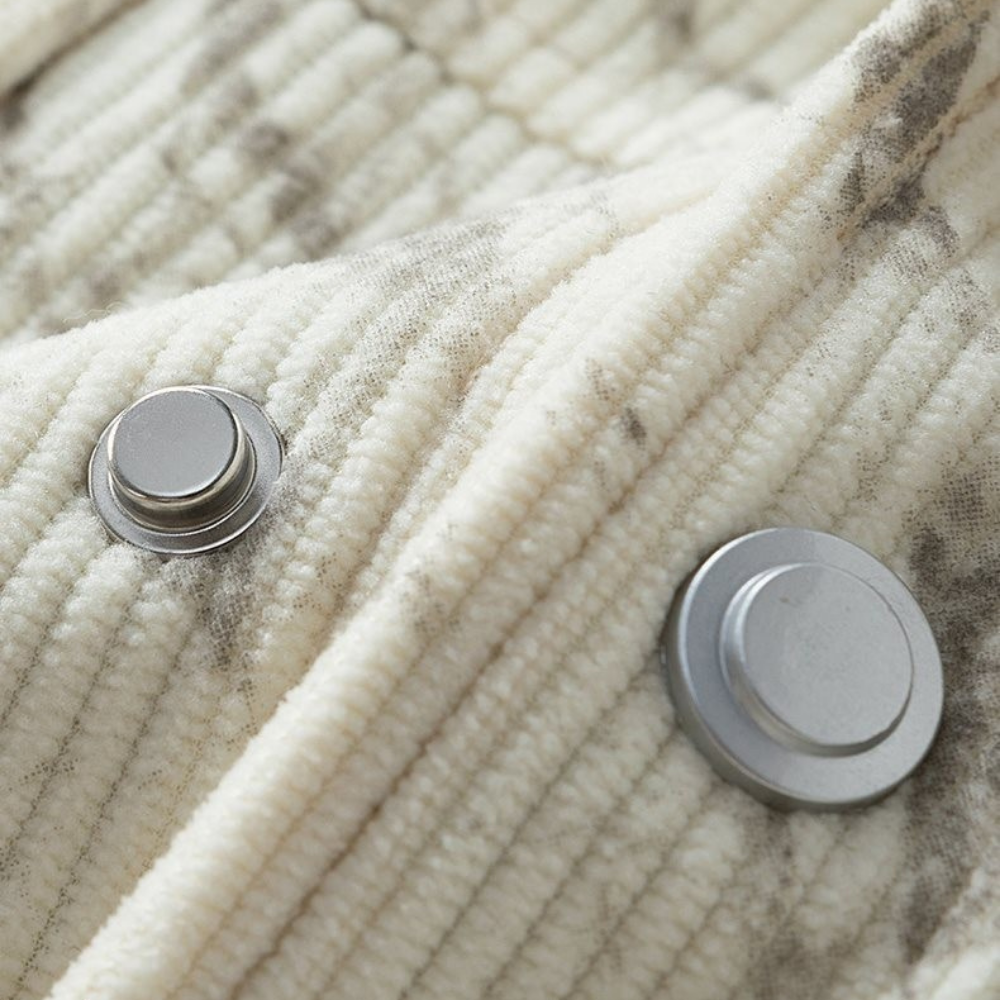 Veste en velours côtelé avec doublure polaire, fermeture à boutons et poches latérales