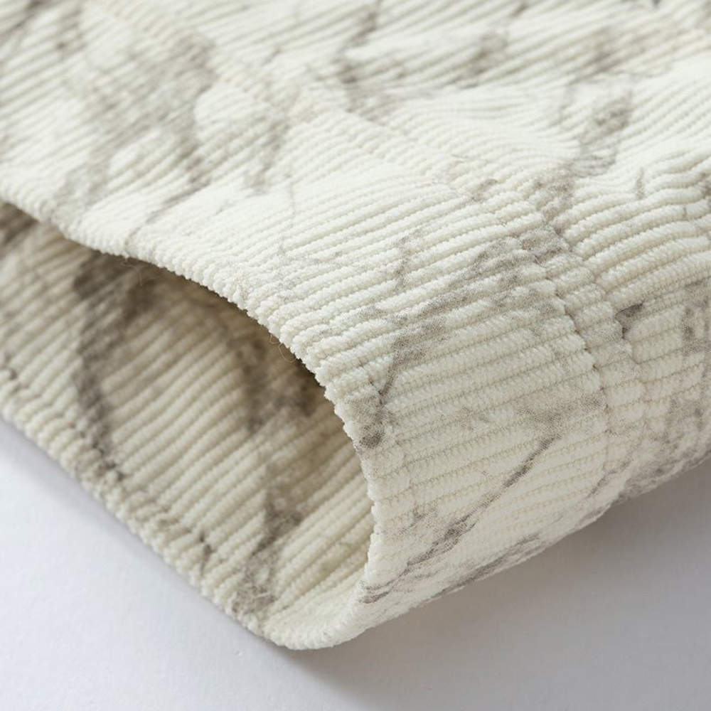 Veste en velours côtelé avec doublure polaire, fermeture à boutons et poches latérales