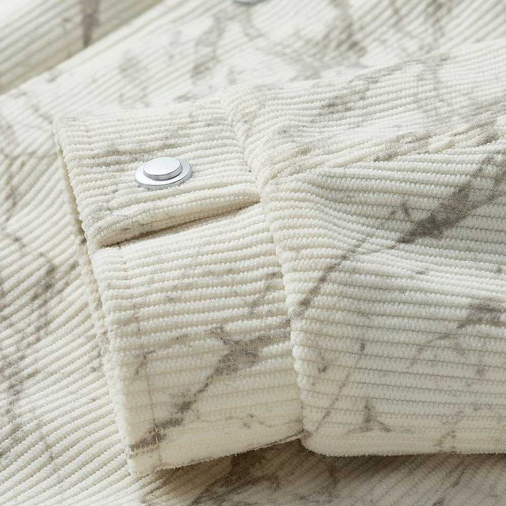 Veste en velours côtelé avec doublure polaire, fermeture à boutons et poches latérales