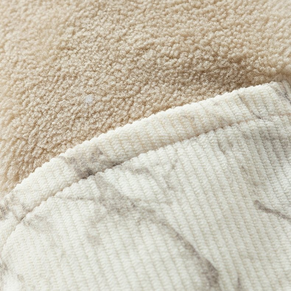 Veste en velours côtelé avec doublure polaire, fermeture à boutons et poches latérales